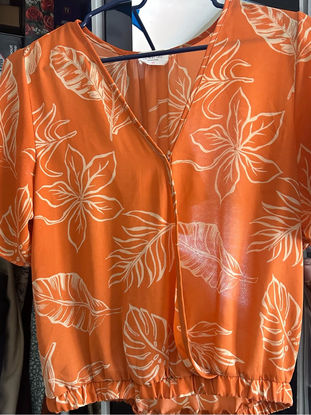 Sienna Sky Orange Floral V-Neck Blouse